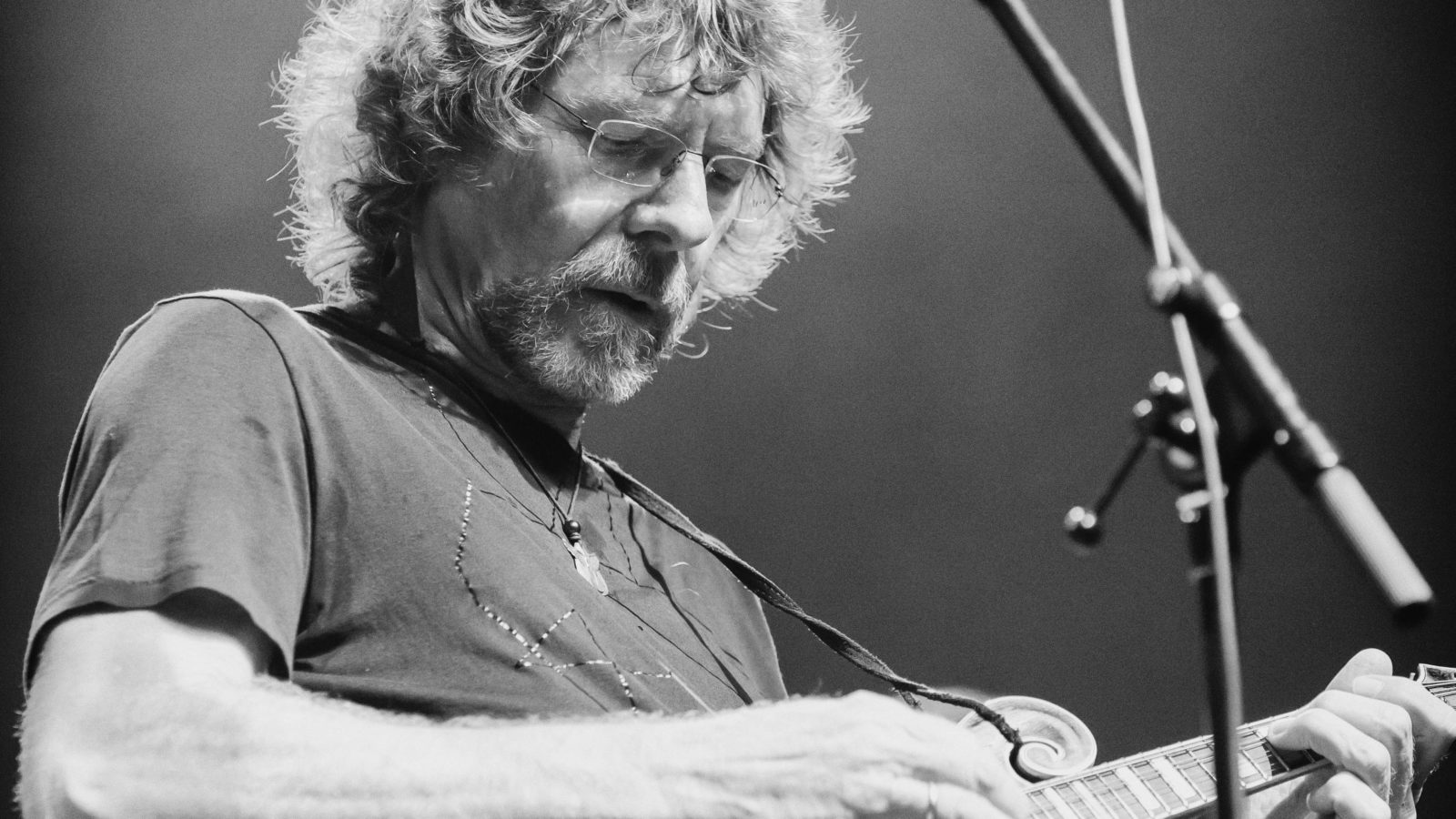 Sam Bush playing mandolin